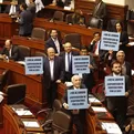 Parlamentarios reclaman con carteles debatir proyecto de ley sobre cooperativas