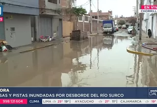 Casas y pistas inundadas por desborde de río Surco en Chorrillos