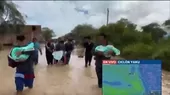 Padre con bebé gemela en brazos se trasladan a pie tras inundaciones en Mórrope - Noticias de inundacion