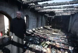 Cristianos de Alepo celebran la Navidad en una iglesia destrozada por la guerra