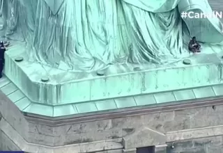 Detienen a mujer que escaló Estatua de la Libertad para protestar contra Trump