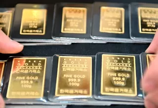 Oro cotiza al alza frente a la caída del dólar y preocupaciones sobre el riesgo de Evergrande