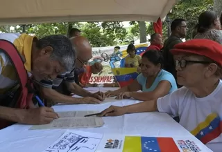 Venezuela: chavistas firman formulario para protestar ante la ONU por bloqueo de EE.UU.