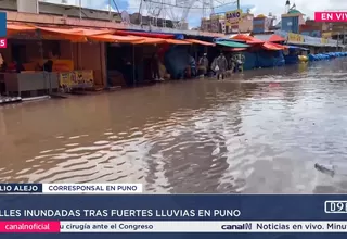 Calles inundadas tras fuertes lluvias en Puno